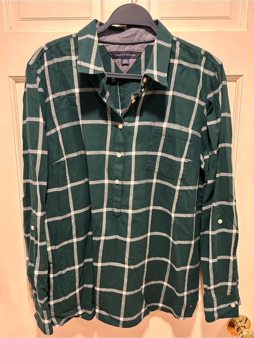 Tommy Hilfiger collared pullover top with buttons and adjustable sleeves.